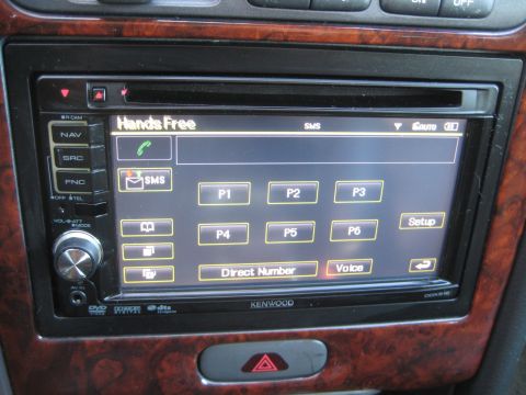 1993 Ford Probe - The Kenwood stereo system displays a "Hands Free" menu with options for SMS and voice commands.