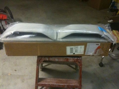 1986 Ford Bronco - Unidentified boxed car part, likely a body panel, in protective packaging.