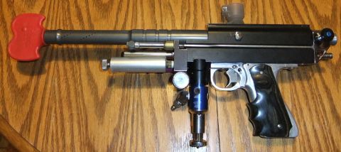 1978 Chevrolet C/K Pickup - This paintball marker features a red foregrip, a silver air tank, and a black grip. The Supermotors logo is visible in the corner.