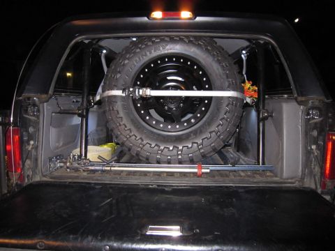 1996 Ford Bronco - The spare tire is mounted inside the rear cargo area of the 1996 Ford Bronco.