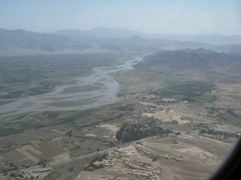 2003 Jeep Wrangler - River valley landscape with settlements and mountains, viewed from above.