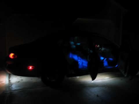 1997 Ford Taurus - I took this one from the back corner, but with the doors open so you can see the blue neons under the dash and back seats