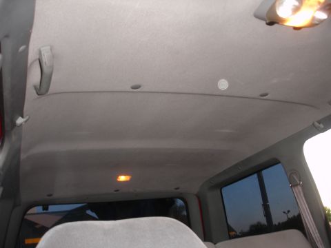 1992 Ford Explorer - Interior view of a 1992 Ford Explorer, showing the headliner and side windows.
