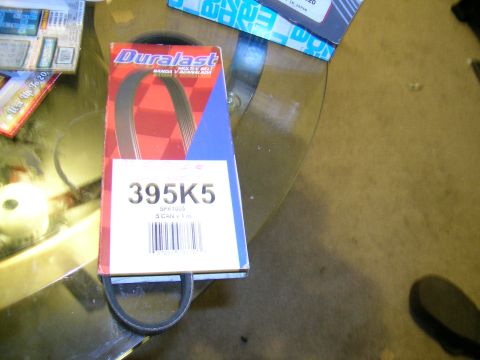 1993 Ford Probe - A Duralast 395K5 serpentine belt is shown, with part number and barcode visible on the packaging.