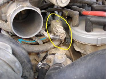1992 Ford Bronco - Engine bay detail showing various hoses, wires, and a sensor highlighted in yellow.