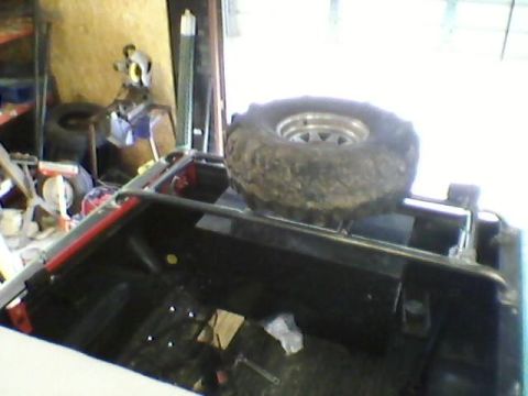 1975 Chevrolet Blazer - spare tire rack w/ cb antennae and light mounts
