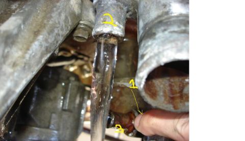 1992 Ford Bronco - Outlet 3, which connected to heater core seems to be stuck.....no water came out while i fill up the radiator with running water. Outlet 1&…
