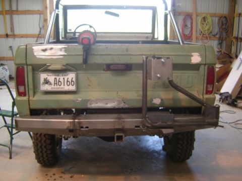 1967 Ford Mustang - Rear view of a 1977 Ford Bronco showing its bumper and tire carrier assembly.