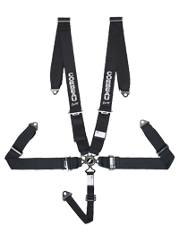 1993 Ford Bronco - This is a black 5-point racing harness with CORBEAU branding visible on the straps.