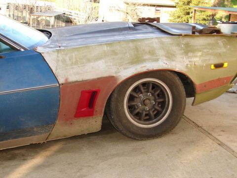 1971 Ford Ranchero - This vehicle appears to be undergoing bodywork, with primer and filler visible on the fender.