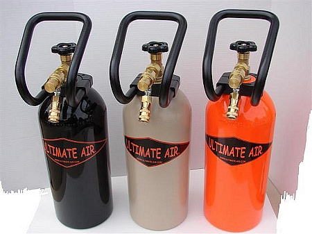 1993 Ford Bronco - Three portable air tanks, each labeled "ULTIMATE AIR", are lined up for display.