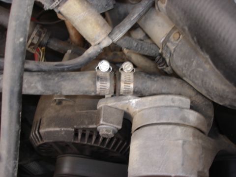 1992 Ford Bronco - Hose-Heater Core Outlet to Water Pump.....Why do some have a tee adapter?