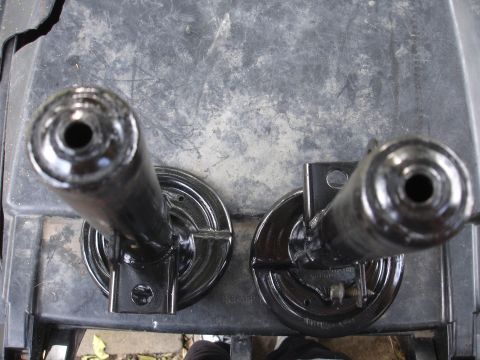 1995 Ford Taurus - Pair of suspension struts, likely for aftermarket upgrade or repair, shown from above.