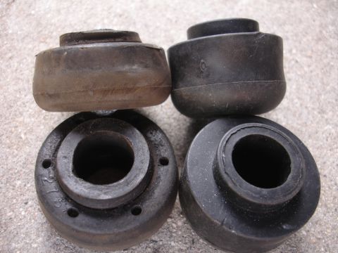 1995 Ford Taurus - These rubber bushings are not identifiable as belonging to a 1995 Ford Taurus.