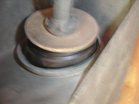1995 Ford Taurus - This image shows a close-up of a suspension component, likely a bushing on a shaft.