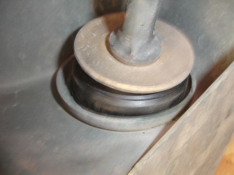 1995 Ford Taurus - Close-up view of a suspension component, likely a bushing, with associated metal parts.