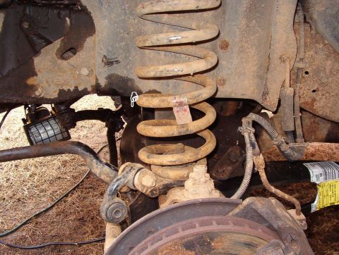 1993 Ford Bronco - With the new radius arm installed, the bend in the axle beam became apparent. There should be daylight where the white pointer is. [url=htt…
