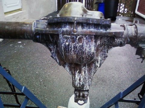 1990 Ford Bronco - Close-up of a differential housing showing casting numbers, likely from a vehicle's rear axle.
