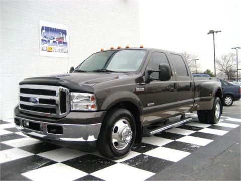 1979 Ford F-150 - This heavy-duty pickup truck features a dual rear wheel setup and a prominent grille.