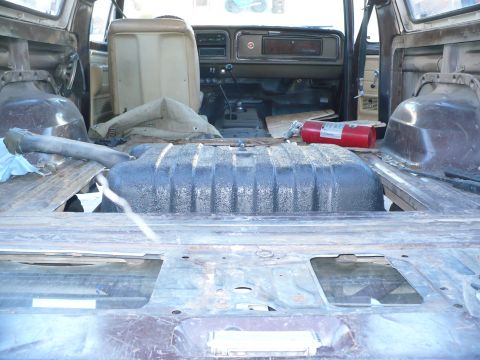 1979 Ford Bronco - Interior view of a 1979 Ford Bronco with the rear section disassembled.