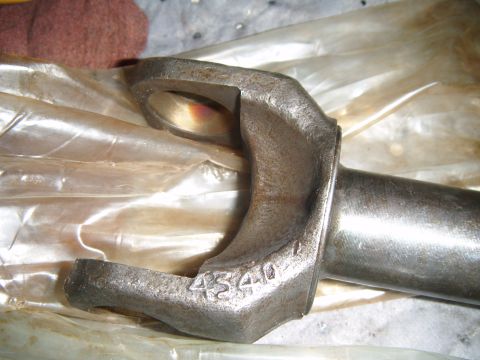 1994 Ford Bronco - Close-up of a metal driveshaft U-joint yoke, showing the casting number 4540.