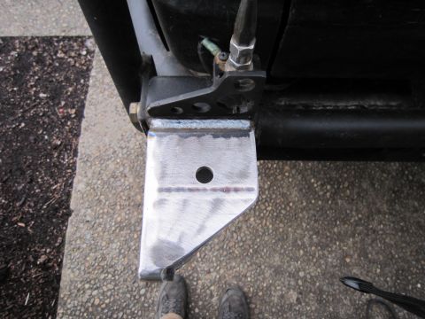 1996 Ford Bronco - Custom metal bracket welded onto a vehicle's frame, showing the fabrication work.