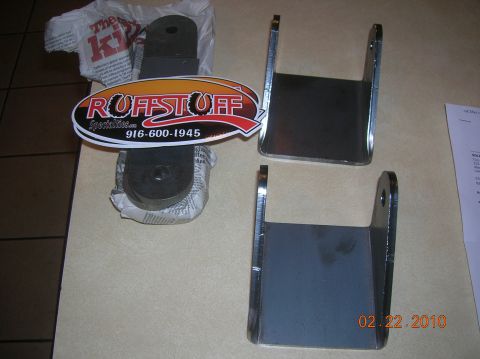 1985 Ford Bronco - Two metal brackets, likely for vehicle suspension, are shown with a Ruffstuff Specialties sticker.