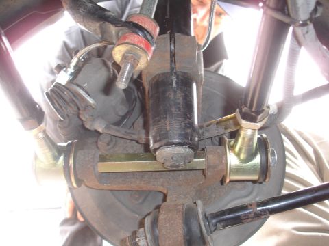 1995 Ford Taurus - Aftermarket suspension components, likely for a performance upgrade, are shown installed on a vehicle's wheel hub assembly.