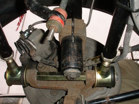 1995 Ford Taurus - Aftermarket rear suspension bracing installed on a vehicle, showing upgraded components.