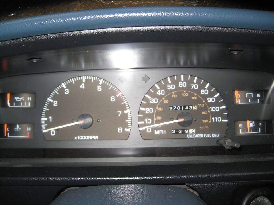 1990 Toyota Pickup/SR5 dashboard with tachometer, speedometer, fuel gauge, temperature gauge, and oil pressure gauge