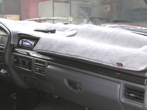 1993 Ford Bronco - Interior view of a 1993 Ford Bronco dashboard, showing the dash cover and stereo system.