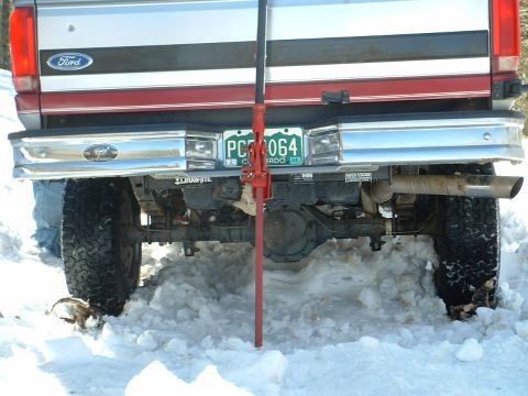1994 Ford Bronco - Here I am using some technologicaly advanced extracting tools, better known as floor mats and twigs.