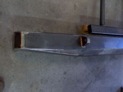 1993 Ford Bronco - Close-up of a fabricated metal bumper section with integrated amber lights.