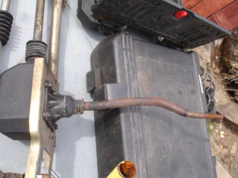 1995 Ford Taurus - A vehicle shifter linkage component is shown, disconnected from its original assembly.