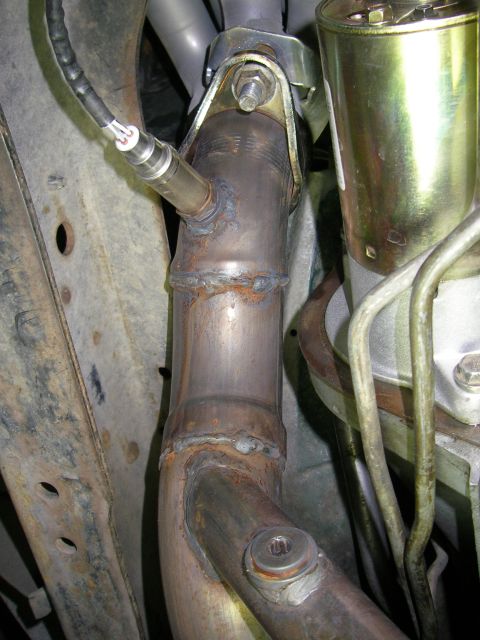 1990 Ford Bronco - Stereo O2 Sensors mounted in new bungs. I need to return a single sensor to the original location as the new WAY1 PCM requires only 1.