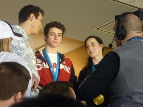 1996 Ford Bronco - Athletes are seen with their medals after an event, possibly a press conference.