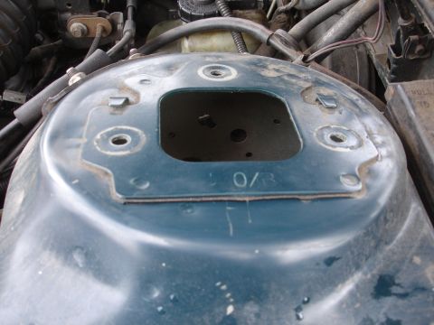 1995 Ford Taurus - Engine bay strut tower with visible markings '0/3'.