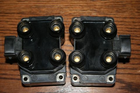 2007 Ford Mustang - A pair of ignition coils are shown, each with four spark plug wire connectors.