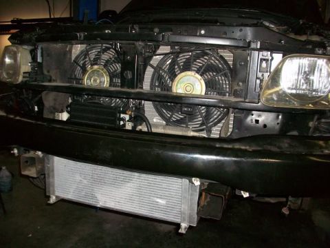 2007 Ford Mustang - Vehicle's front end showing an upgraded radiator and cooling fan setup.
