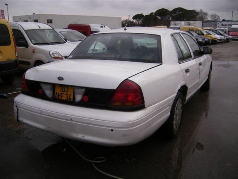 1991 Ford Crown Victoria - Rear view of a 1991 Ford Crown Victoria, showing its taillights and license plate.