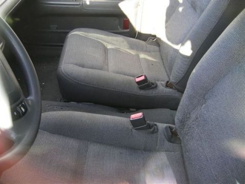 1991 Ford Crown Victoria - Interior view of a 1991 Ford Crown Victoria, showing the front and rear seats.