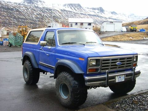 1986 Ford Bronco - This blue Ford Bronco has a distinctive grille and body style consistent with the early 1980s.