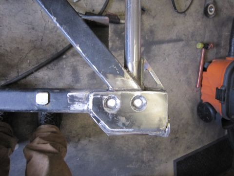 1996 Ford Bronco - A close-up view of a metal frame section, possibly from a vehicle bumper, showing construction details.