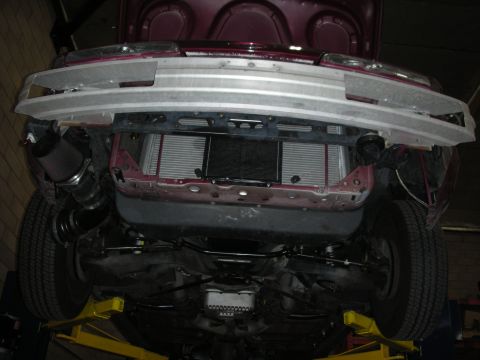 1992 Ford Crown Victoria - Custom intercooler and air intake installed on a vehicle, viewed from underneath.