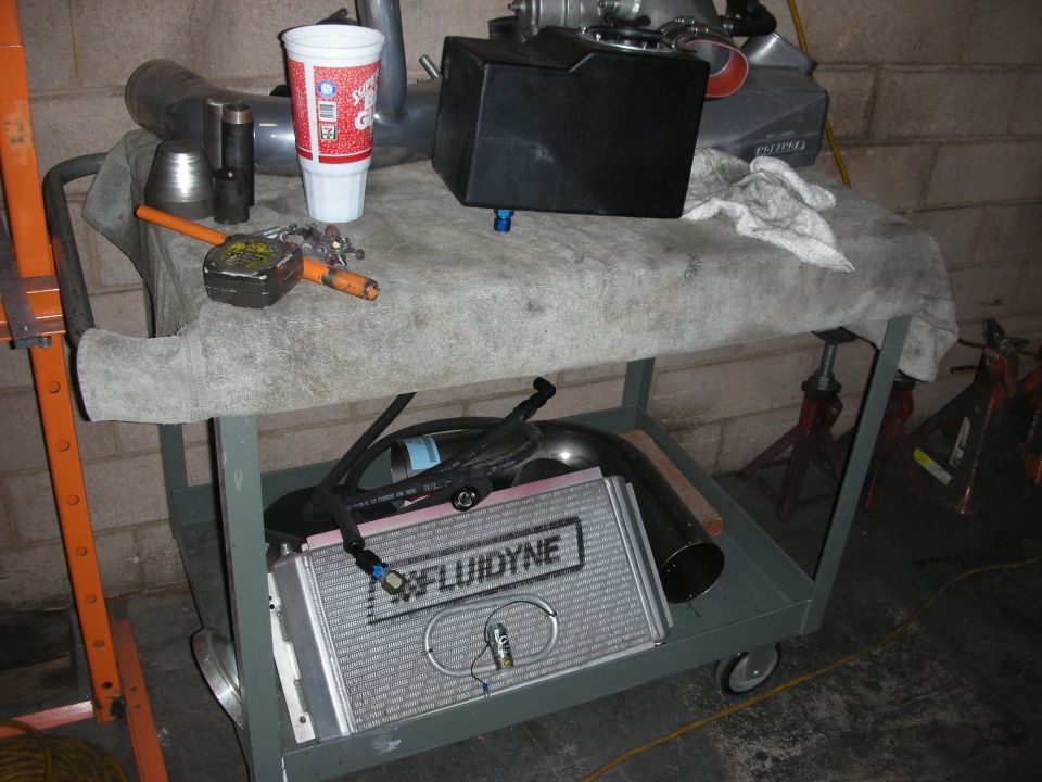 Cart with intercooler, hoses, cup, and tools