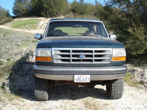 1993 Ford Bronco - This 1993 Ford Bronco is seen from the front, its distinctive grille and a California license plate.