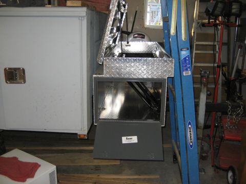 1996 Ford Bronco - Garage scene with a toolbox and Werner ladder, no vehicles visible.