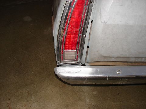 1973 Ford Ranchero - Close-up of the rear corner of a 1973 Ford Ranchero, showing the taillight and bumper.