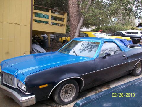 1973 Ford Ranchero - This 1973 Ford Ranchero GT shows its two-tone paint job and classic grille from a 3/4 front angle.
