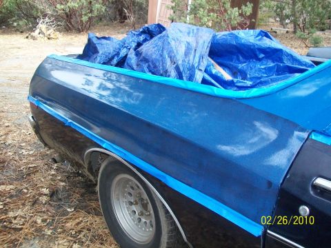 1973 Ford Ranchero - Rear view of a 1973 Ford Ranchero, prepped for paint with blue masking tape.